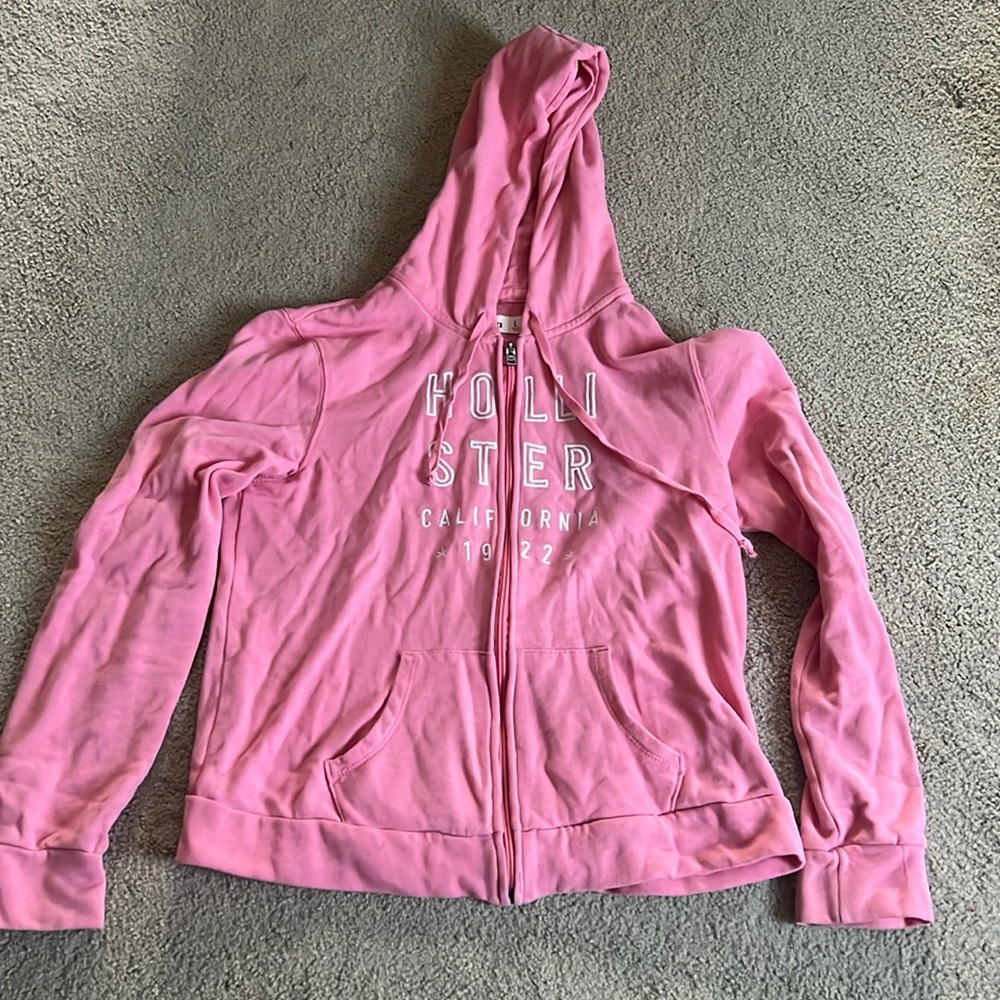 Women’s Hollister large pink zip up hoodie. Size L like new condition